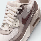 Details the high-definition textile weave across the expanded toe box and the precision double-stitching around the front mudguards.