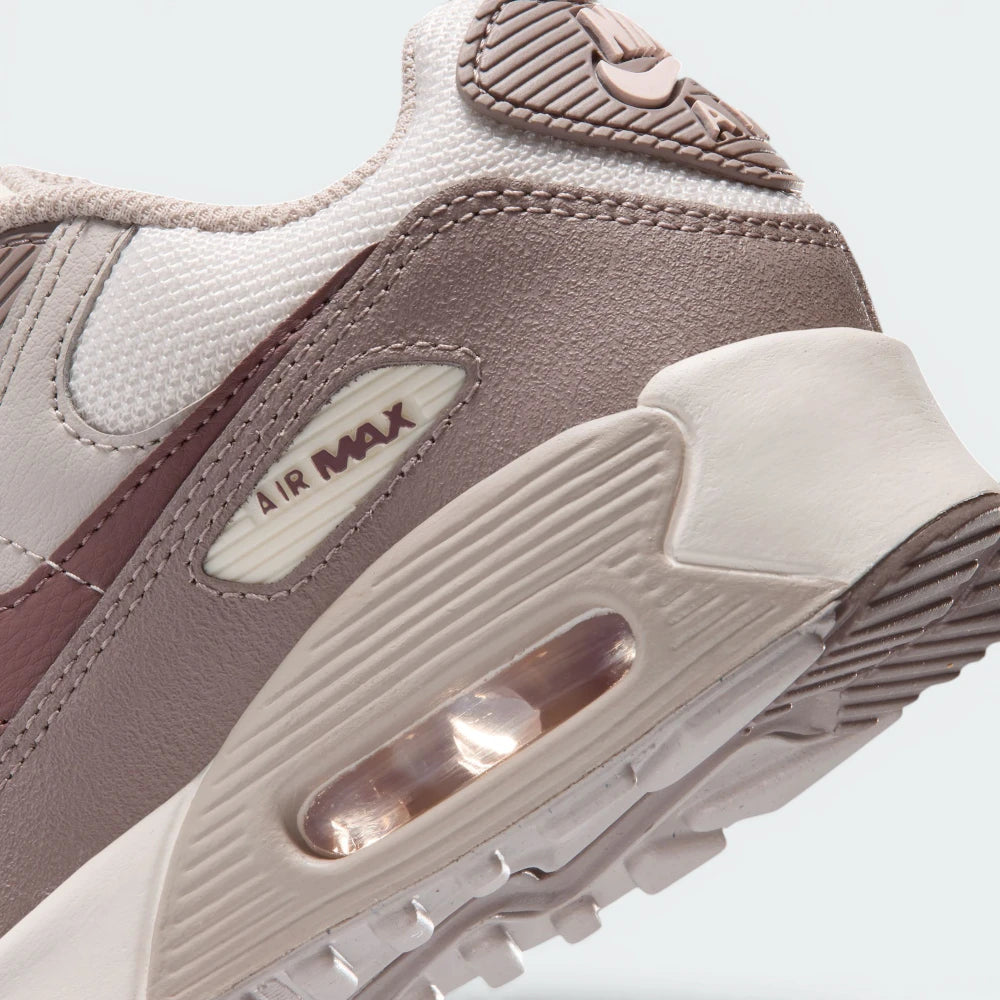 Highlights the "unreal" clean finish where the visible Air window frame sits tightly bonded into the stable foam midsole wall.