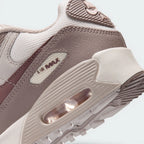 Highlights the "unreal" clean finish where the visible Air window frame sits tightly bonded into the stable foam midsole wall.