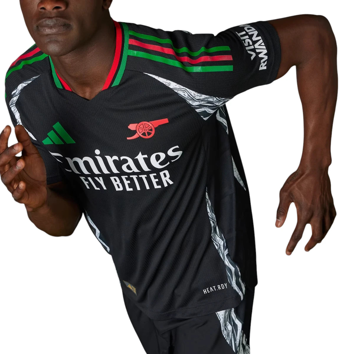 Dynamic angled shot of a model in motion wearing the jersey, emphasizing the ergonomic slim fit, shoulder 3-Stripes, and sleeve sponsor placement.