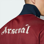 View from behind looking at the shoulders, showcasing the tailored '70s-inspired cut and the high stand-up collar.