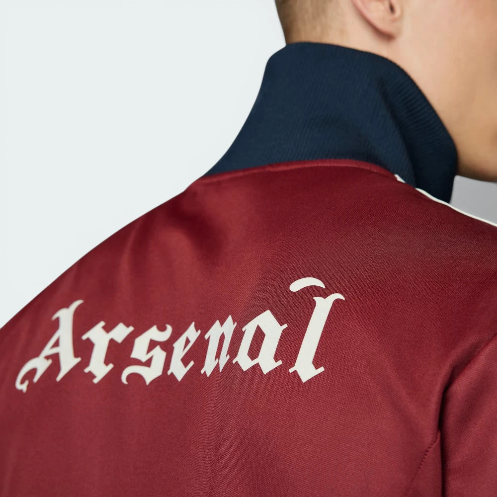 View from behind looking at the shoulders, showcasing the tailored '70s-inspired cut and the high stand-up collar.