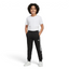 Trade Sports Adidas black French terry track pants with white 3-stripes worn by a young boy with a white t-shirt