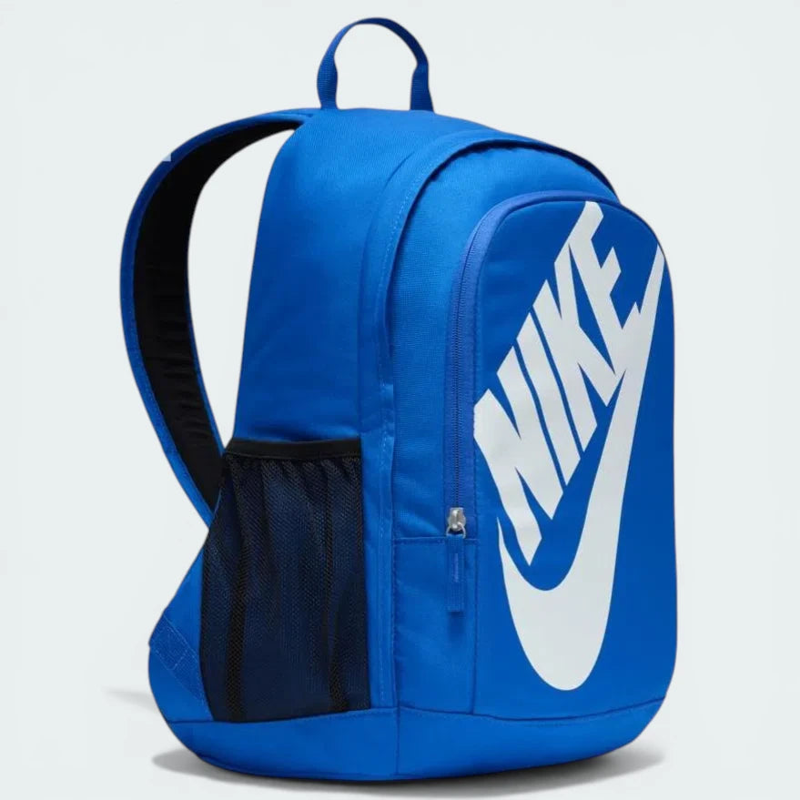 Three-quarter view of the bag, emphasizing the vibrant blue colourway and the sturdy top haul loop.