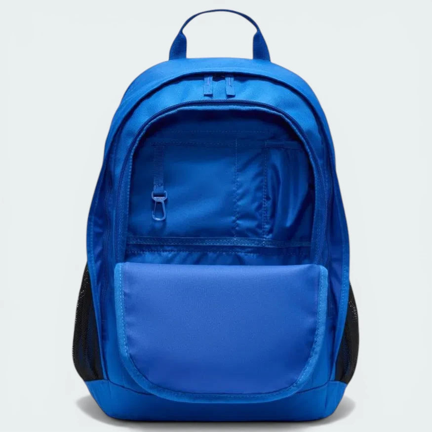 Close-up of the front panel, focusing on the crisp white screen-printed Nike Futura graphic and the durable polyester weave.