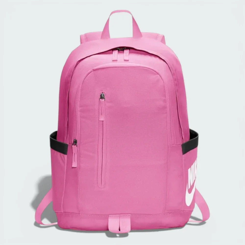 Main profile of the pink Nike All Access Soleday backpack, showing the slim construction and zippered side pocket. Main image