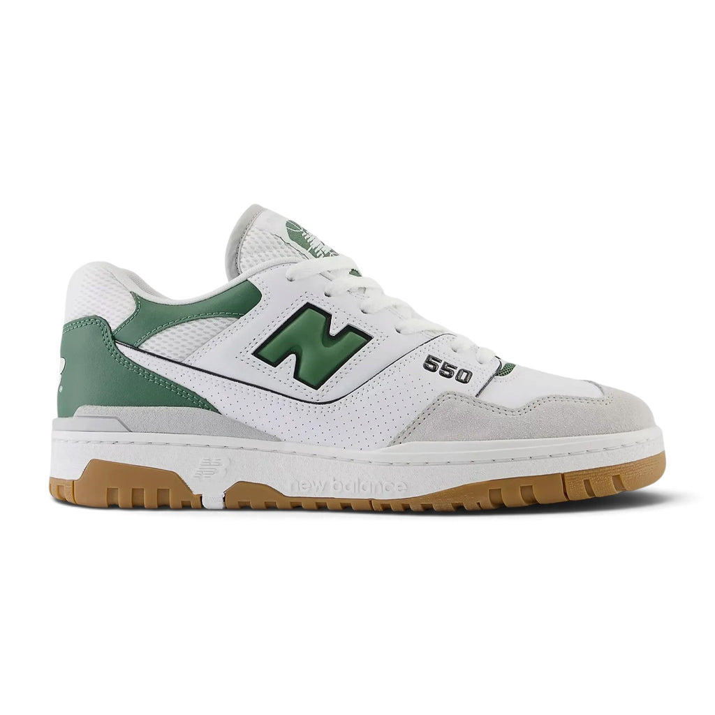 Displays the full lateral silhouette featuring the crisp white full-grain leather upper, perforated midfoot panels, Brighton Grey suede toe bumper, puffed two-tone 'N' logo with Nori green border, stitched white midsole, and rubber outsole rim.