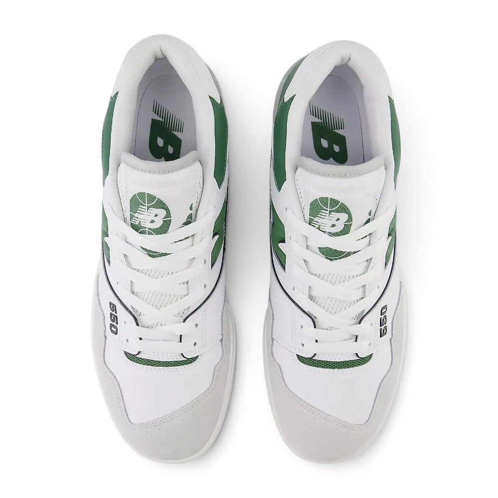 Direct overhead view of both shoes laid flat, showcasing the Brighton Grey suede toe overlay, perforated leather vamp, flat white laces threaded through reinforced eyelets, padded mesh tongue with basketball graphic crest badge, and cushioned comfort sockliner.