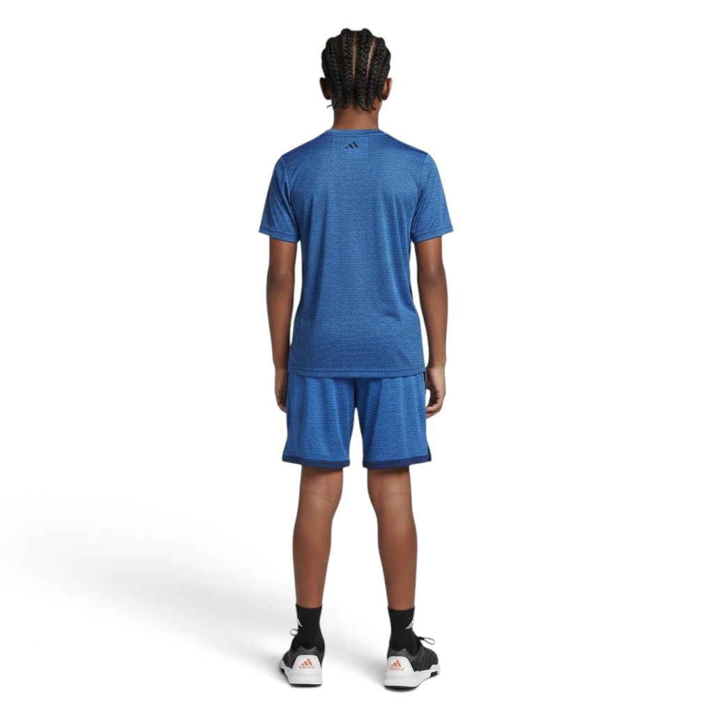 Person wearing a blue athletic outfit on a gray background
