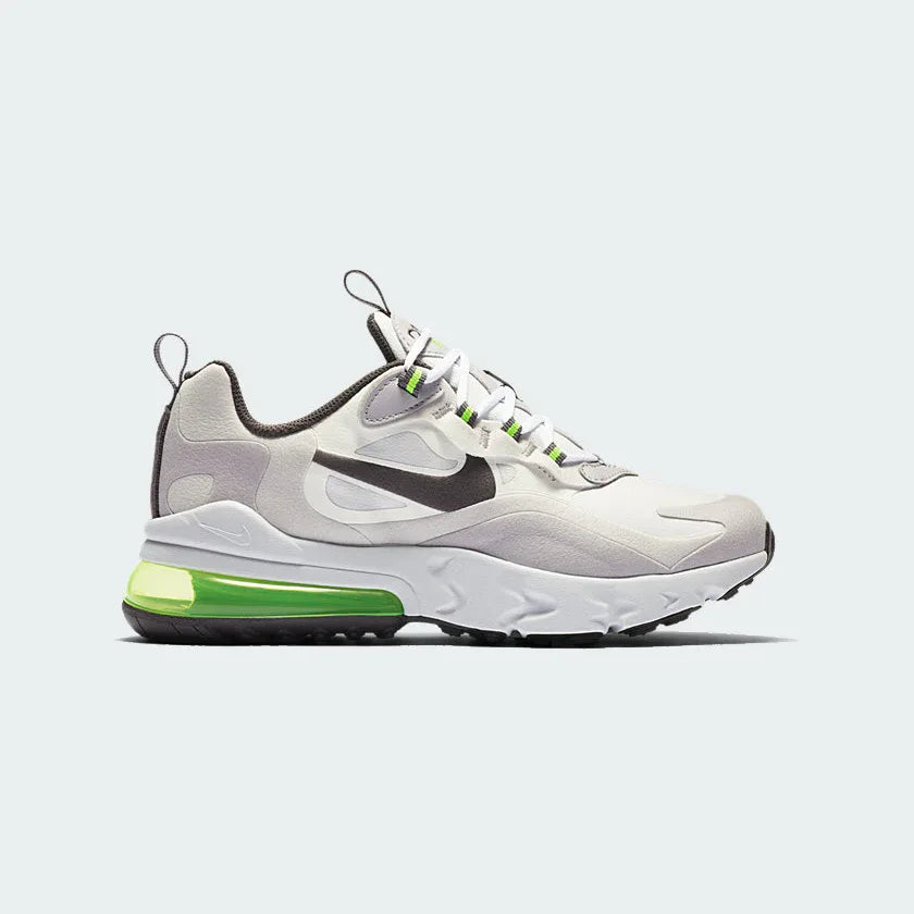 Nike Air Max 270 Juniors' trainers in summit white with silver and lilac accents, side profile showing prominent 270-degree visible Max Air unit and mesh upper. Main image