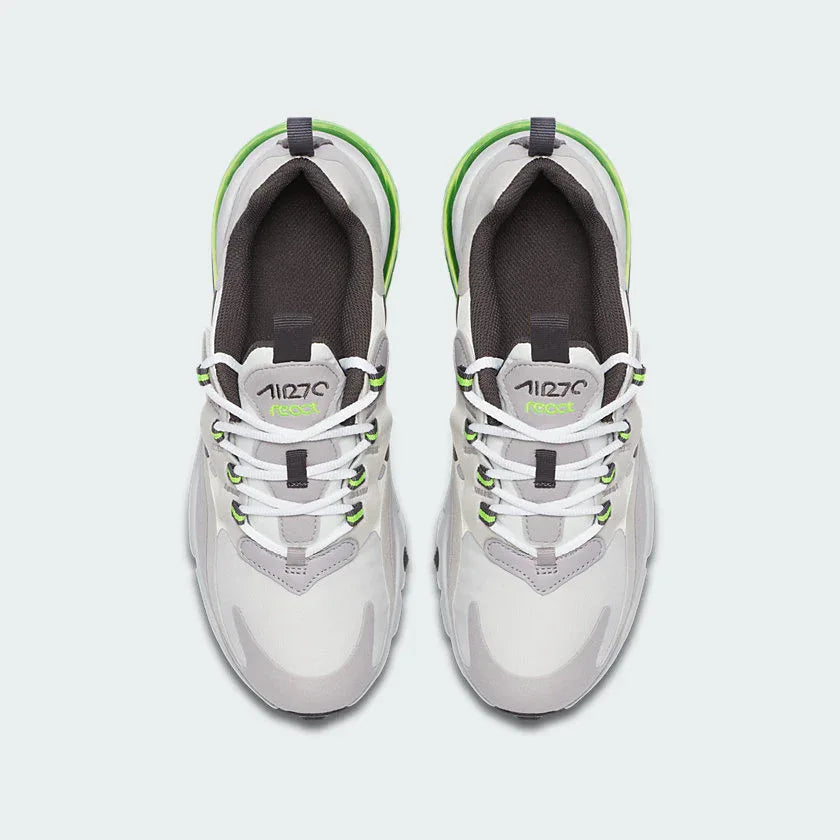 Top-down view of a pair of Nike Air Max 270 Juniors' trainers in white, highlighting their sleek silhouette and lace-up closure.