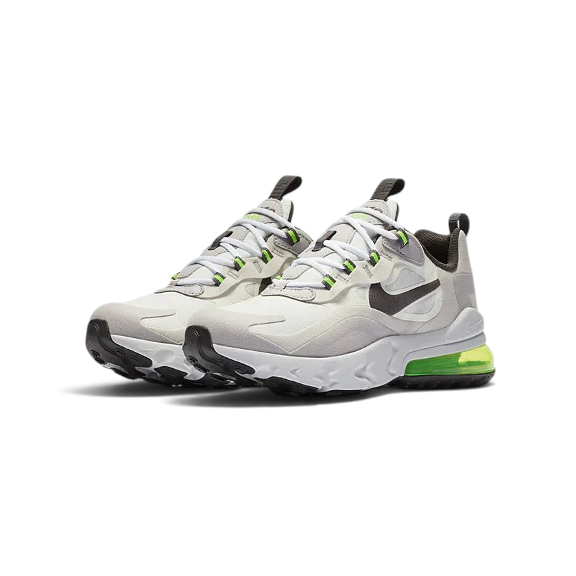 Angled view of two Nike Air Max 270 Juniors' trainers in summit white, silver, and lilac, side by side, showcasing their bold design and visible Air unit.