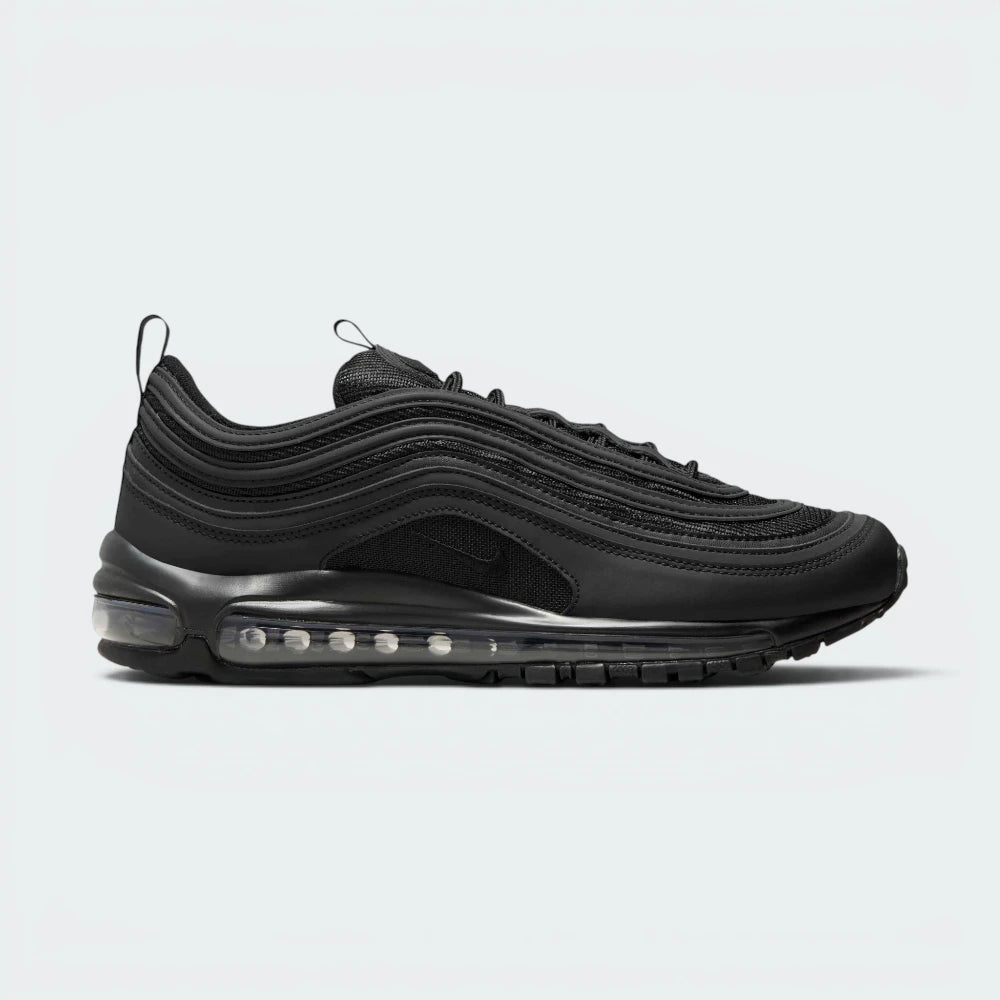 Highlights the high-velocity sweep of the layered black synthetic waves, showing the clean contrast of the miniature white side Swoosh and the translucent full-length Max Air unit embedded in the white midsole wall. Main image