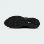 Displays the classic segmented waffle-adjacent geometric tread pattern of the black rubber sole, engineered for unreal everyday multi-surface street grip.