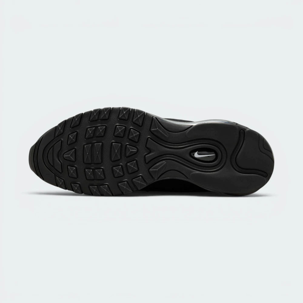 Displays the classic segmented waffle-adjacent geometric tread pattern of the black rubber sole, engineered for unreal everyday multi-surface street grip.