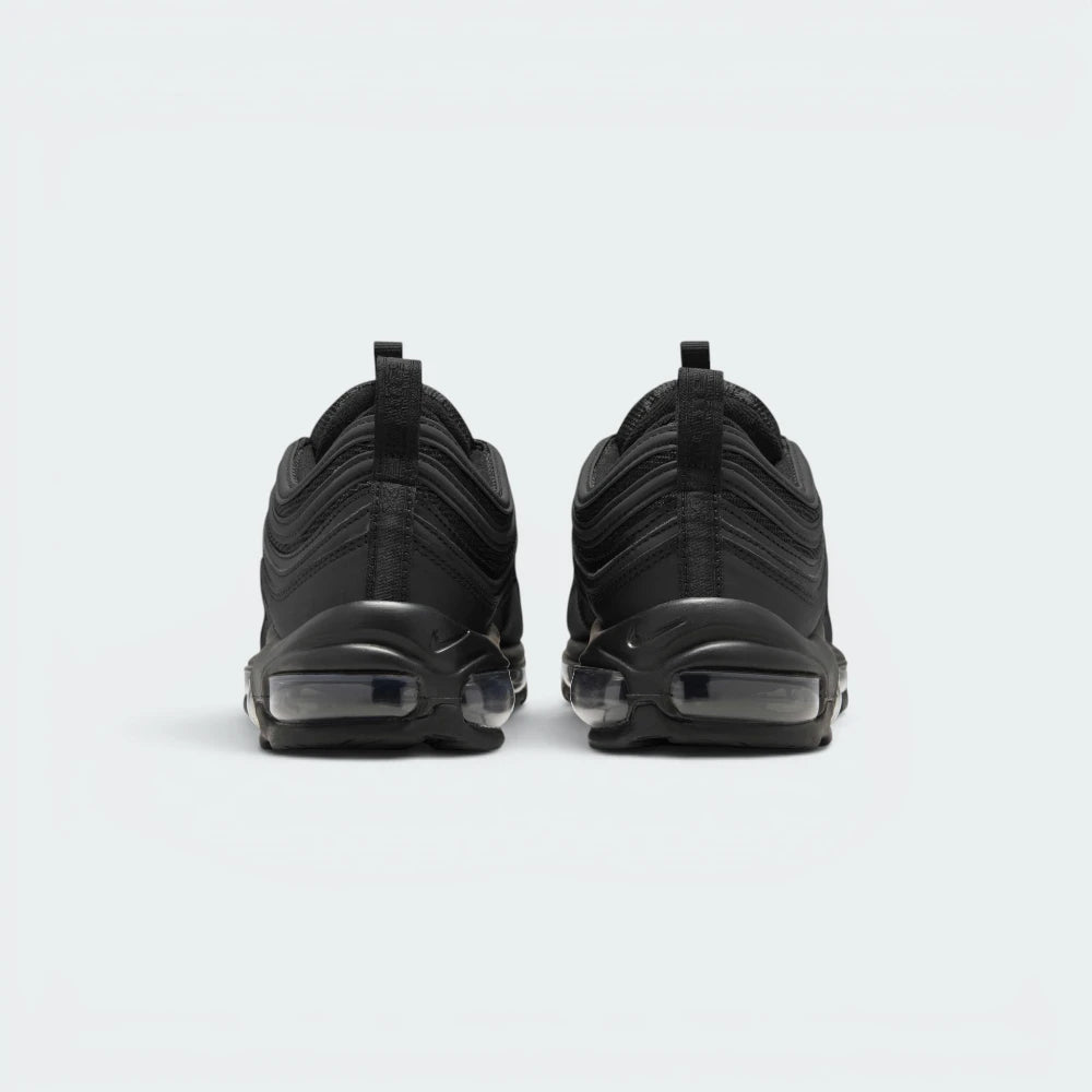 Focuses on the contoured shape of the rear heel spine, highlighting the vertical black pull loop featuring clean white "Air Max" typography.