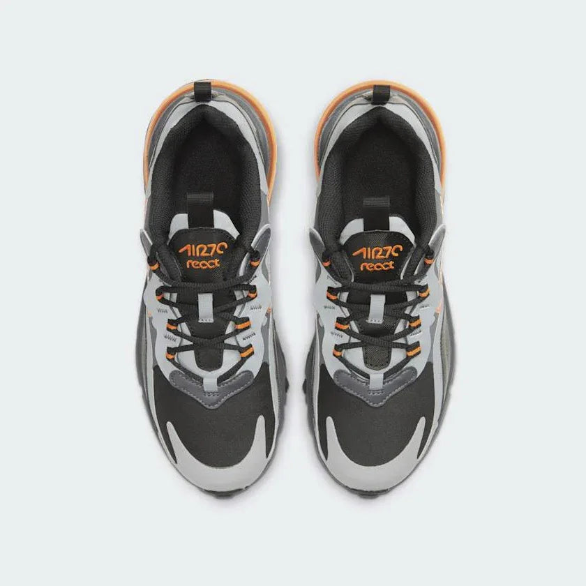Top-down view of a pair of Nike Air Max 270 React Winter Juniors' trainers in black, highlighting their sleek silhouette and lace-up closure.
