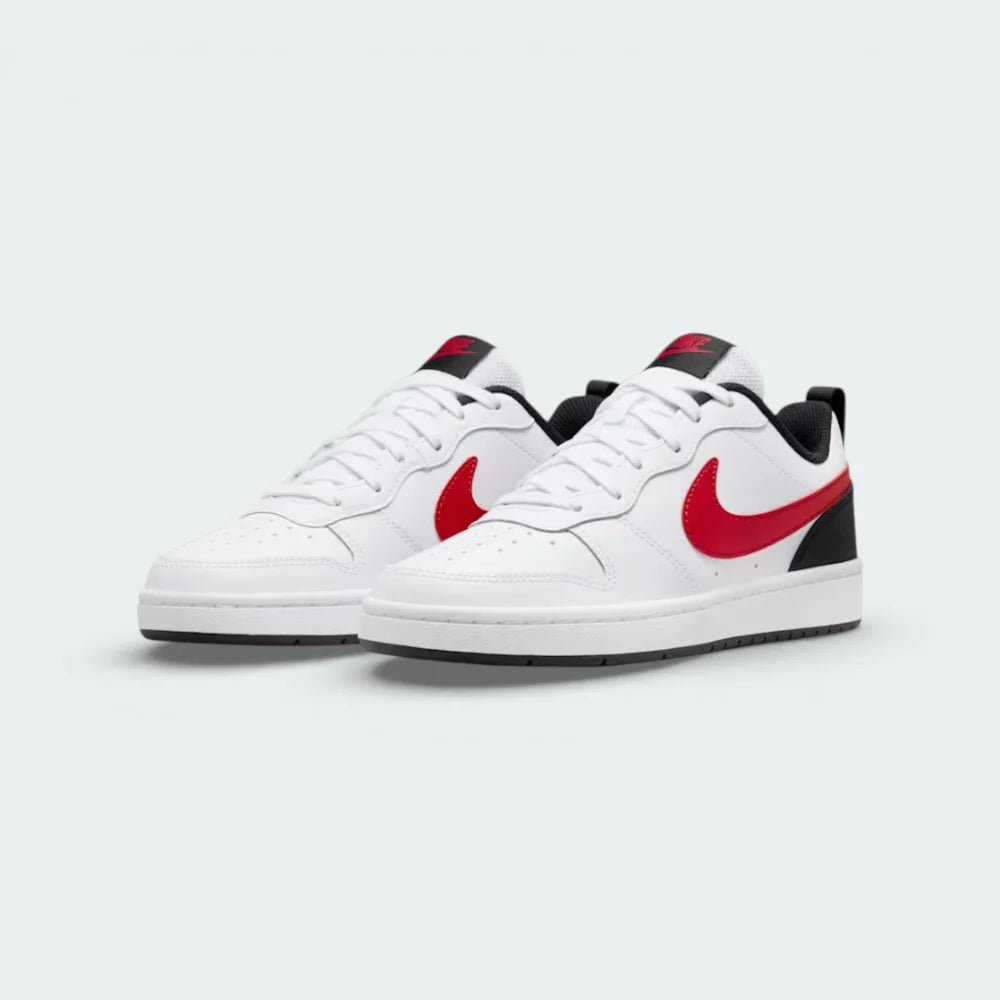 Angled shot of both Nike Court Borough trainers, showcasing the retro hoops silhouette and the high-contrast red and white leather-look finish.