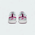 Rear view of the Nike Court Borough Low 2 Girls' trainers, focusing on the heel panel and Nike branding.