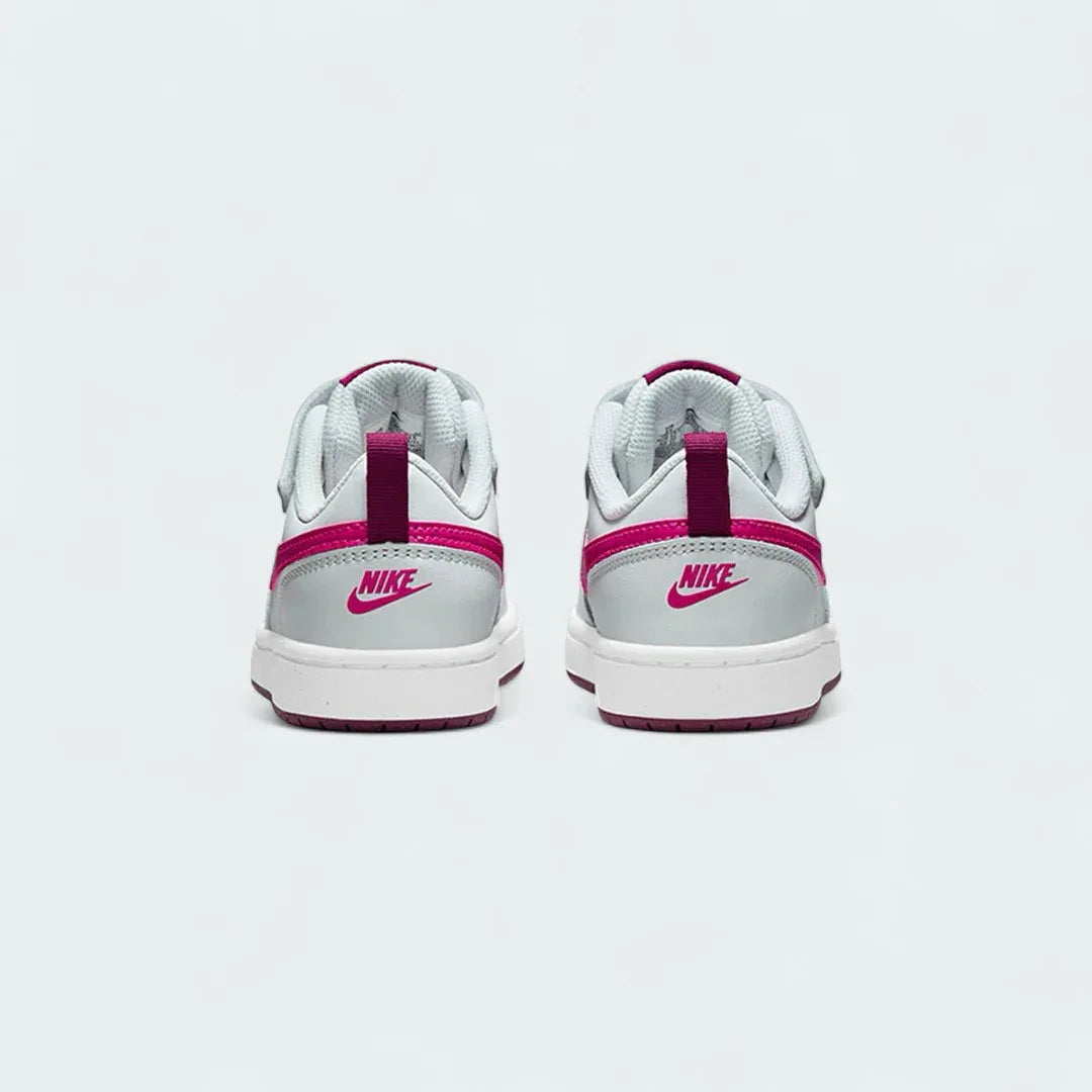 Rear view of the Nike Court Borough Low 2 Girls' trainers, focusing on the heel panel and Nike branding.