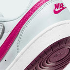Detailed zoom on the outsole and midsole of the Nike Court Borough Low 2 Girls' trainers, highlighting the classic rubber cupsole construction.