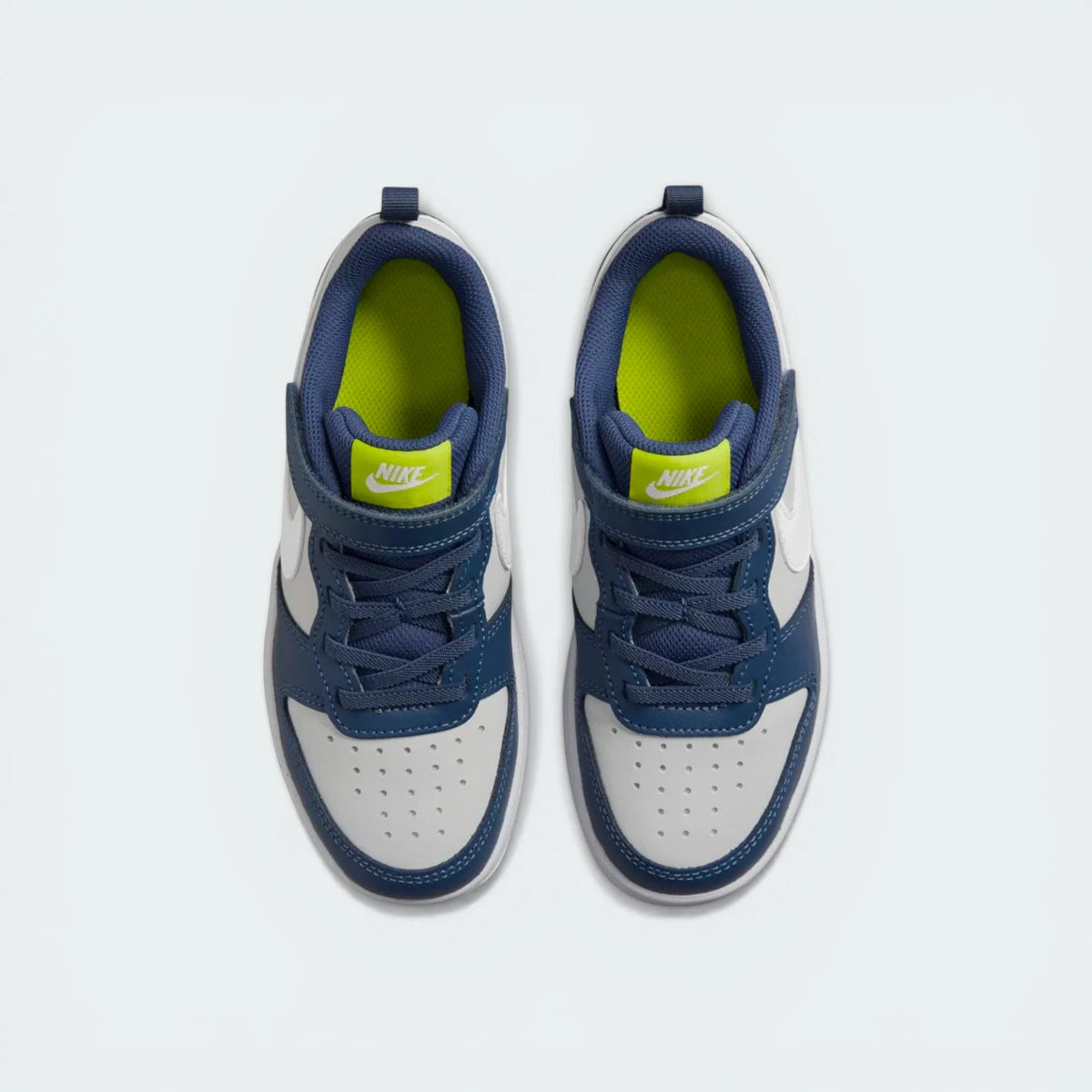 Looking down at the grey lacing system, the perforated toe box, and the Nike branding on the tongue.