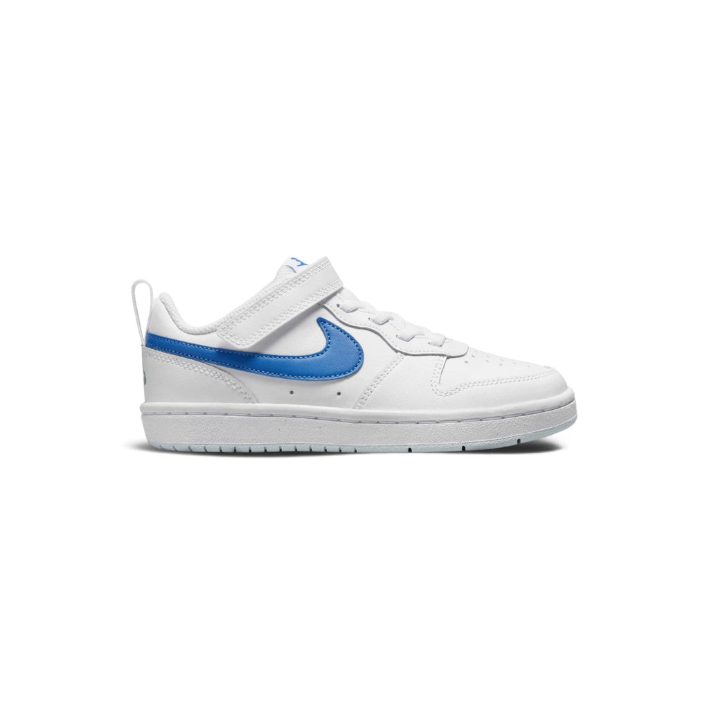 Side profile of the Nike Court Borough Low 2 Children's Trainer in White and Photo Blue, highlighting the leather upper, vibrant blue Swoosh, and supportive rubber sole.