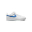 Side profile of the Nike Court Borough Low 2 Children's Trainer in White and Photo Blue, highlighting the leather upper, vibrant blue Swoosh, and supportive rubber sole.