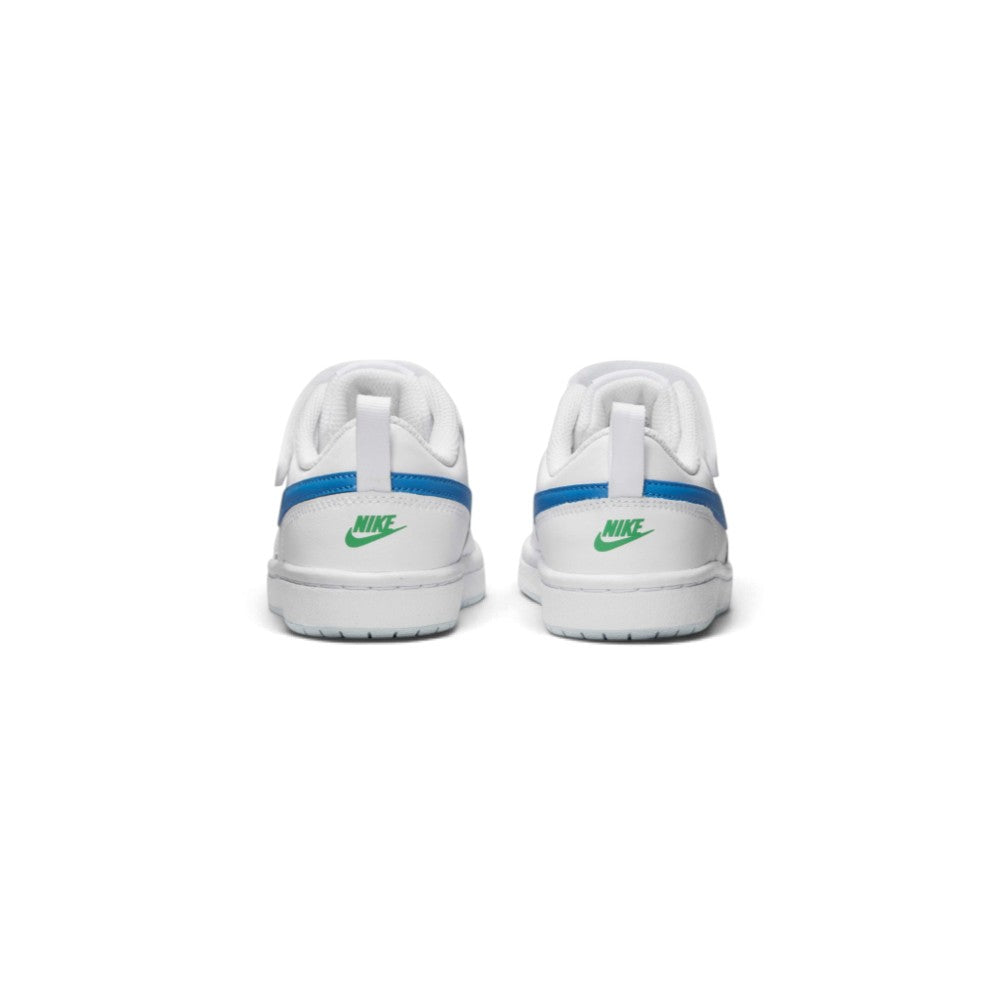 Rear view of the sneakers emphasizing the heel pull loops, blue ankle collar trim, and green Nike branding embroidered on the heel tabs.