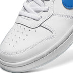 Macro focus on the forefoot, detailing the fine leather grain, toe box ventilation perforations, and stitching lines.