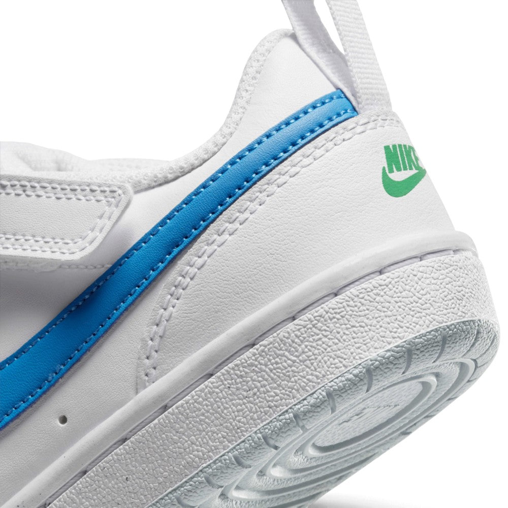 Macro view of the lateral heel transition, highlighting the textured rubber sole wrap and clean edge stitching along the upper.