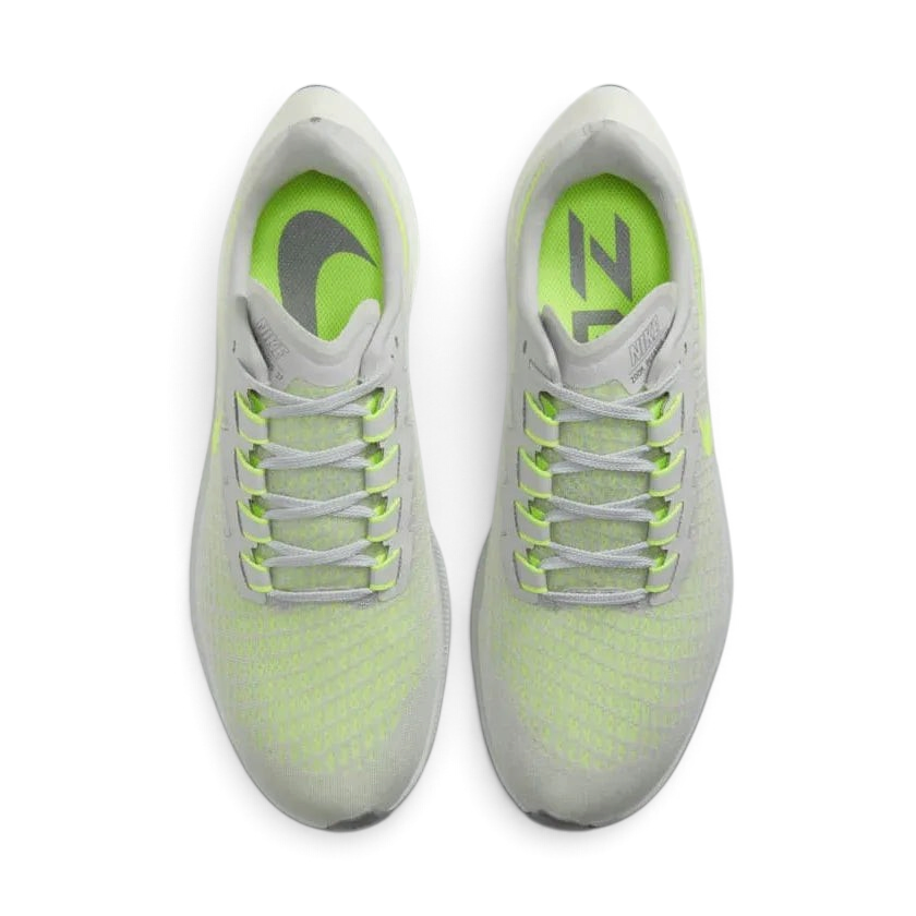 Top-down view of a pair of Nike Air Zoom Pegasus 37 Men's running trainers in grey, highlighting their streamlined silhouette and lace-up closure.