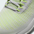 Close-up zoom on the front of the Nike Air Zoom Pegasus 37 Men's grey running trainers, showing the breathable engineered mesh texture and integrated lacing system with Flywire cables.