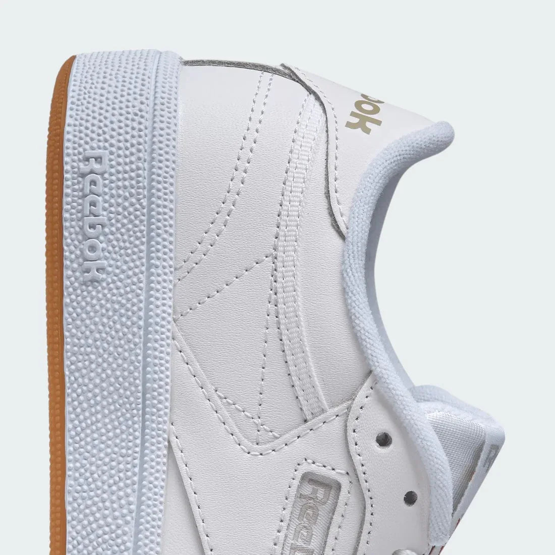 Rear underside close-up of Reebok Club C 85 Women's White Leather Trainers BS7686 heel and rubber outsole with textured grip