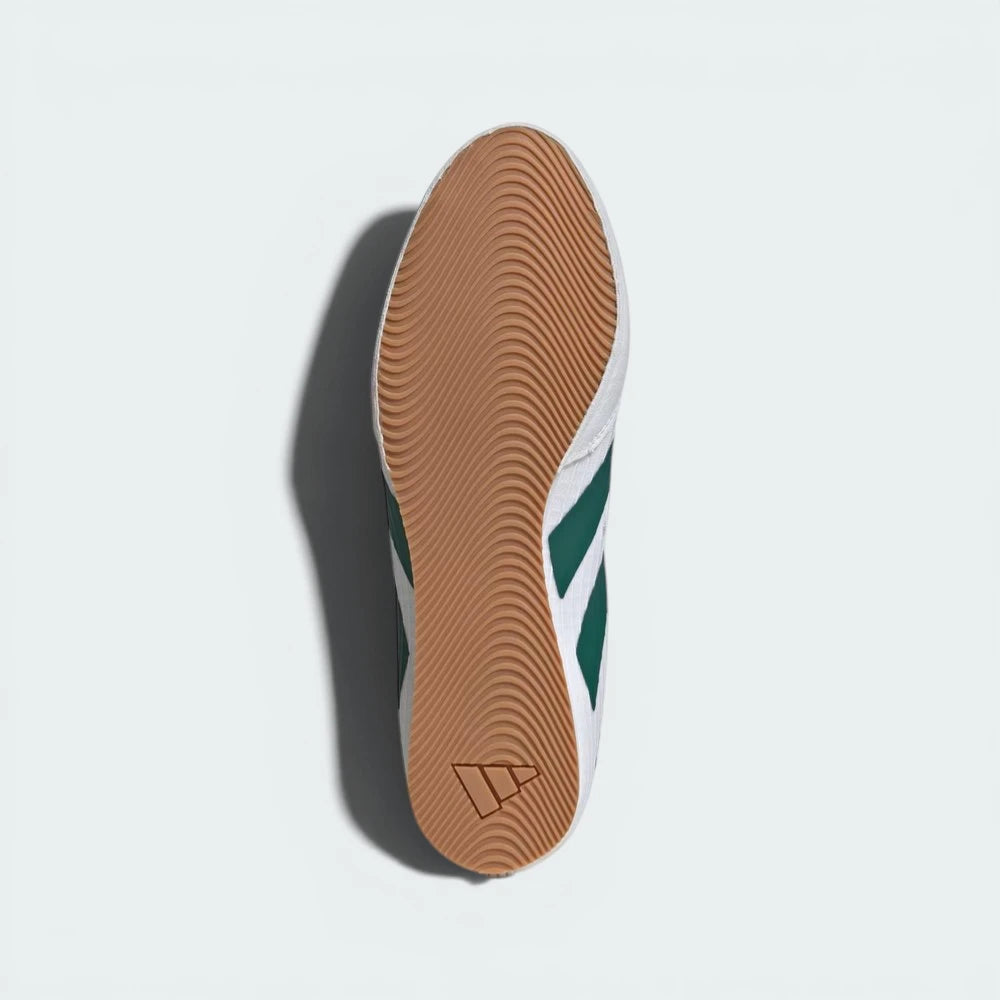 View of the thin rubber outsole, detailing the multidirectional grip pattern designed for ring mats.