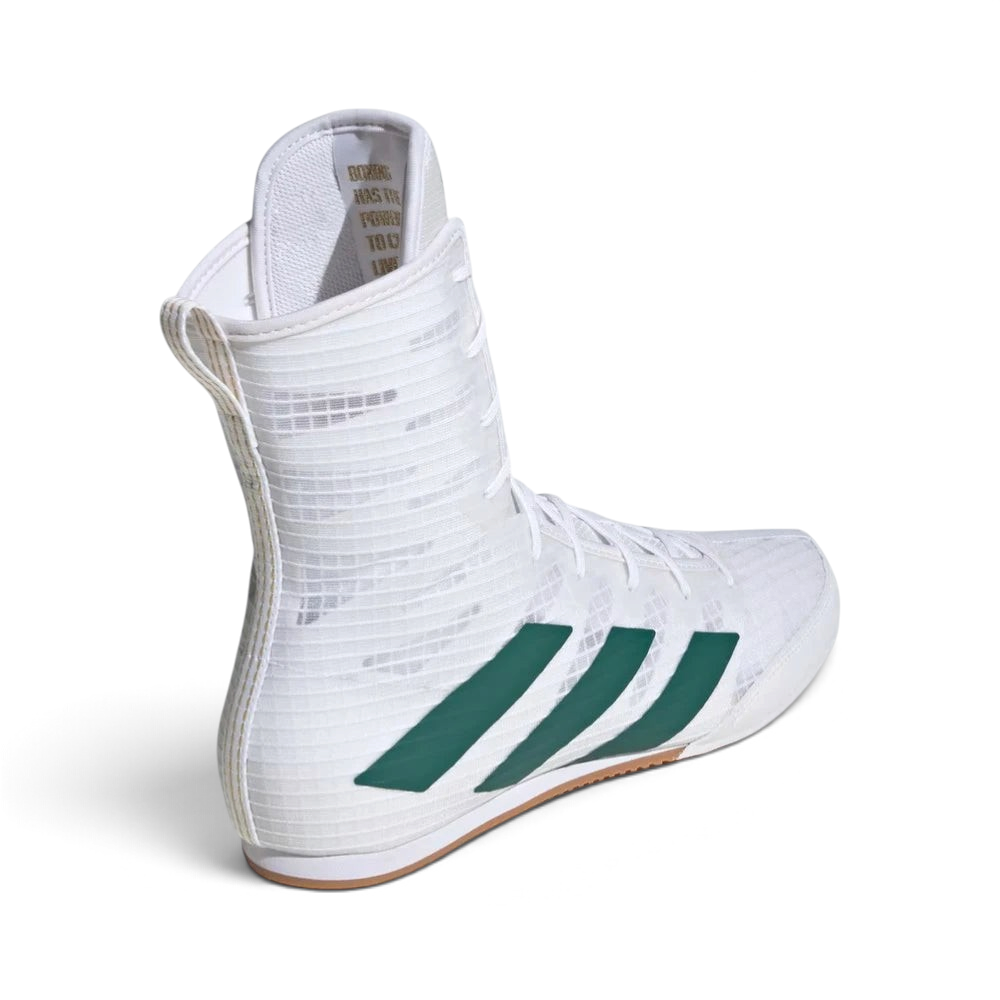 Rear view of the boots, focusing on the structured heel support and the clean white textile finish.