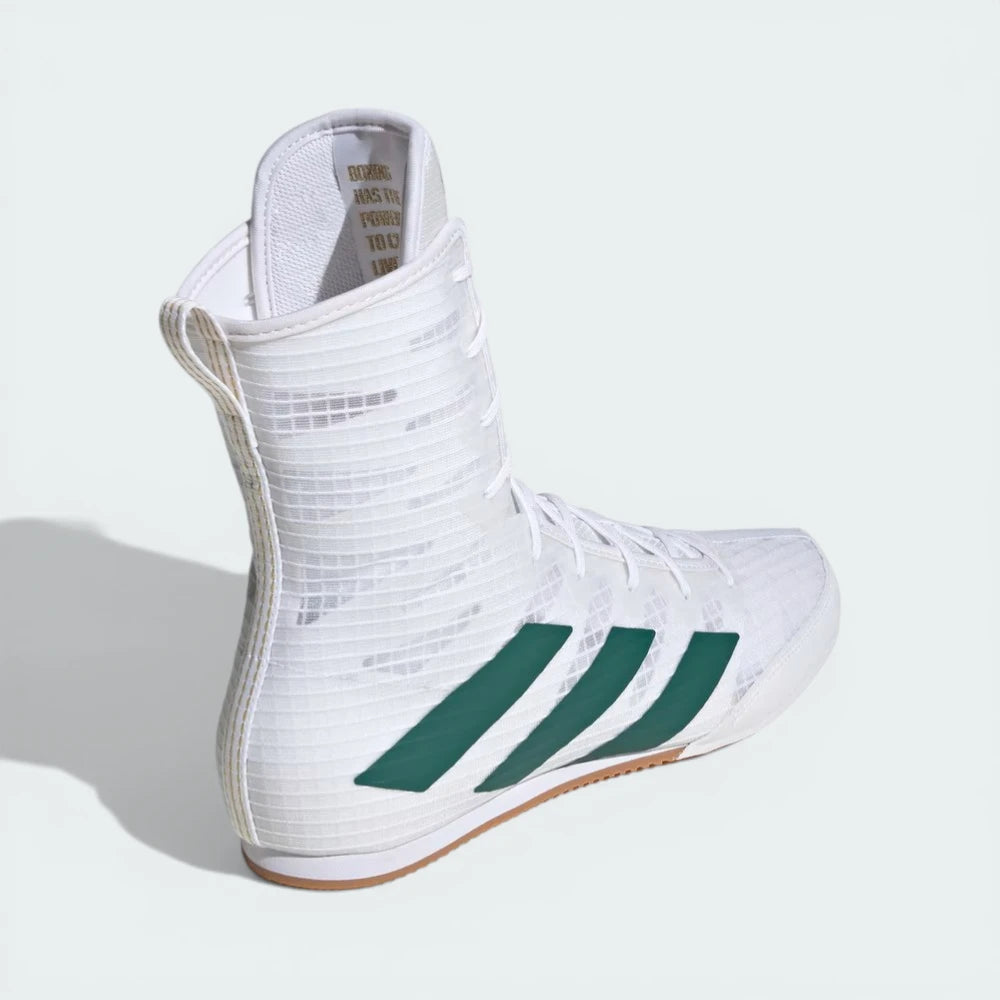 Rear view of the boots, focusing on the structured heel support and the clean white textile finish.