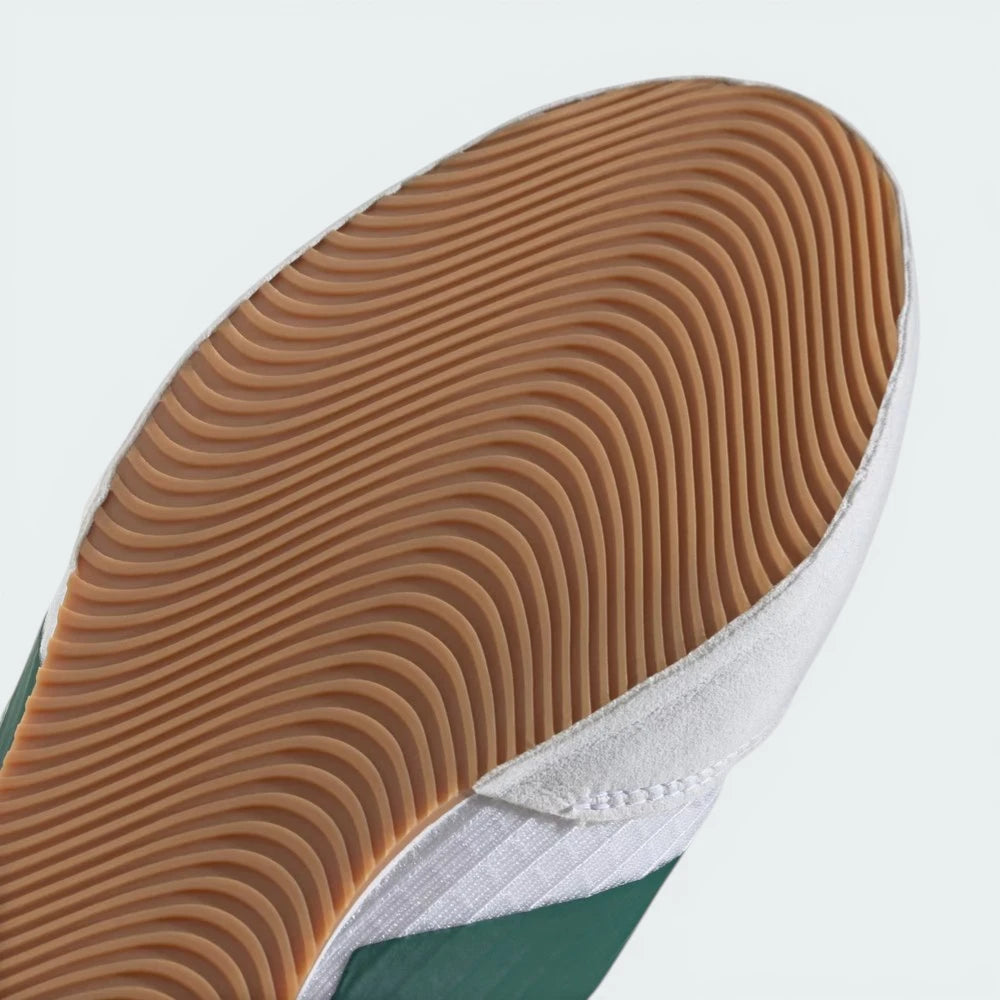 Detailed zoom on the EVA midsole wedge and the "50% Recycled" branding, showcasing the sustainable performance engineering.