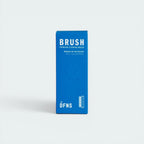 Blue box of a premium cleaning brush with 'DFNS' branding on a white background