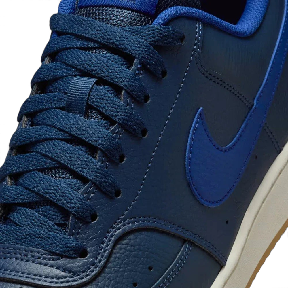 Close-up of the front, showing the quality of the tumbled leather and the traditional lace-up closure.