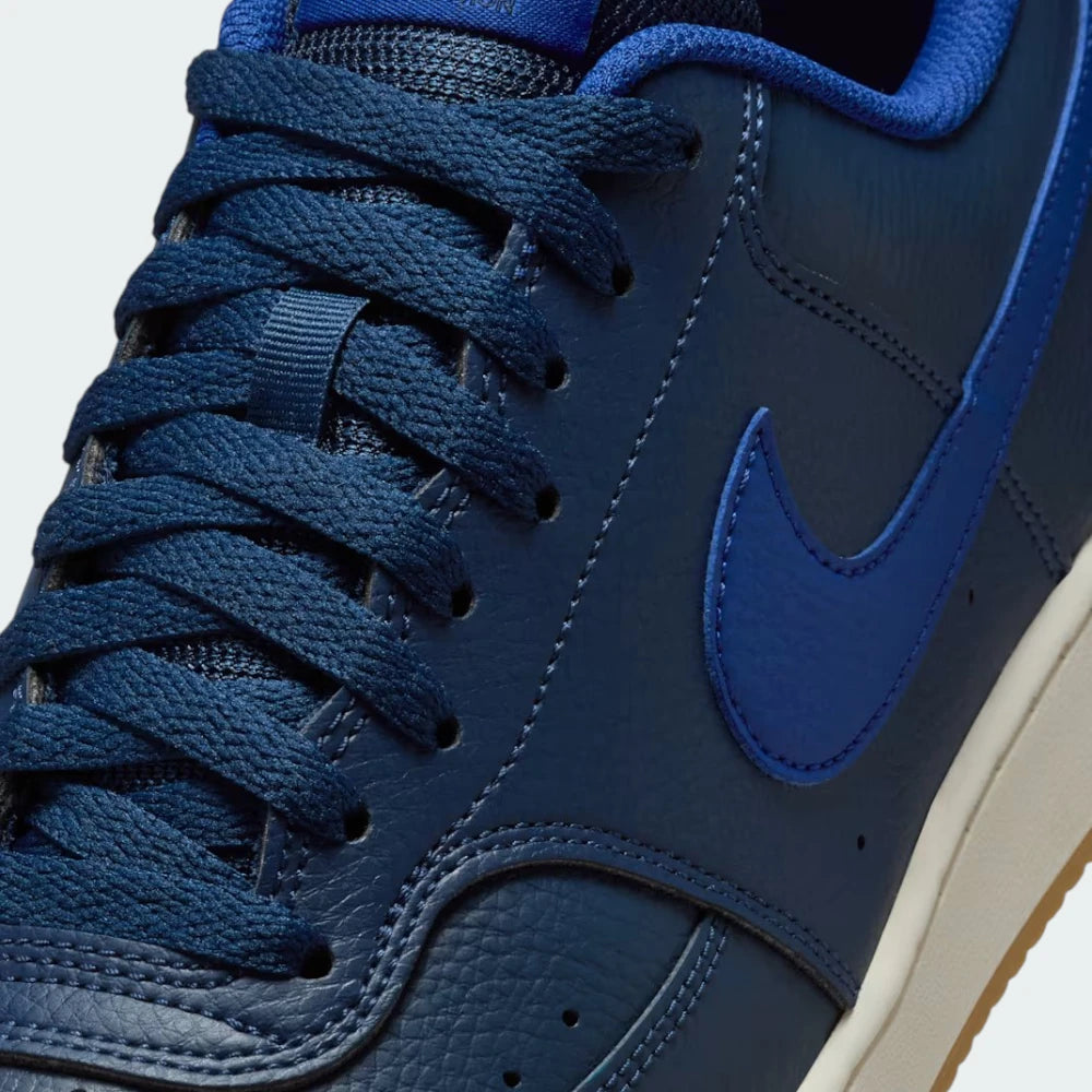 Close-up of the front, showing the quality of the tumbled leather and the traditional lace-up closure.