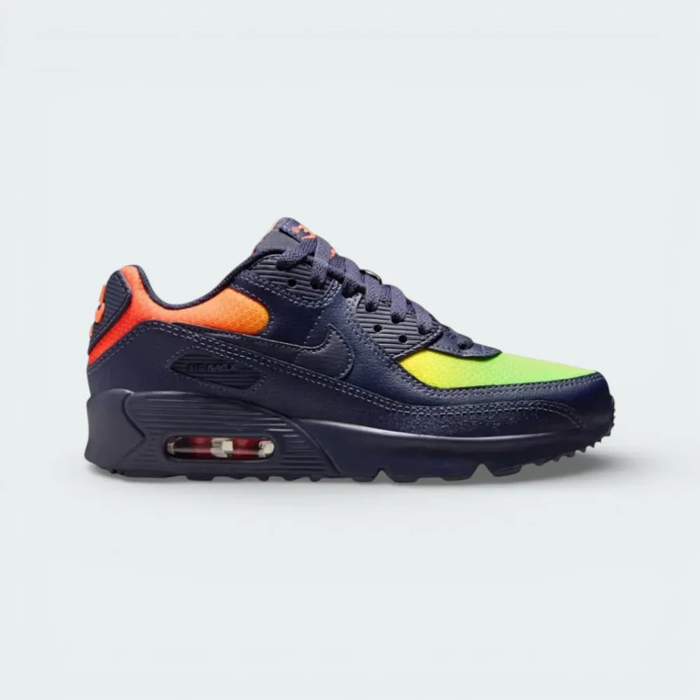 Side profile of the Nike Air Max 90 Leather, showing the Blackened Blue navy upper, vibrant Lemon Venom accents, and the iconic visible Air unit.