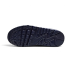 View of the rubber outsole, showcasing the legendary waffle traction pattern and the flex grooves in the forefoot.