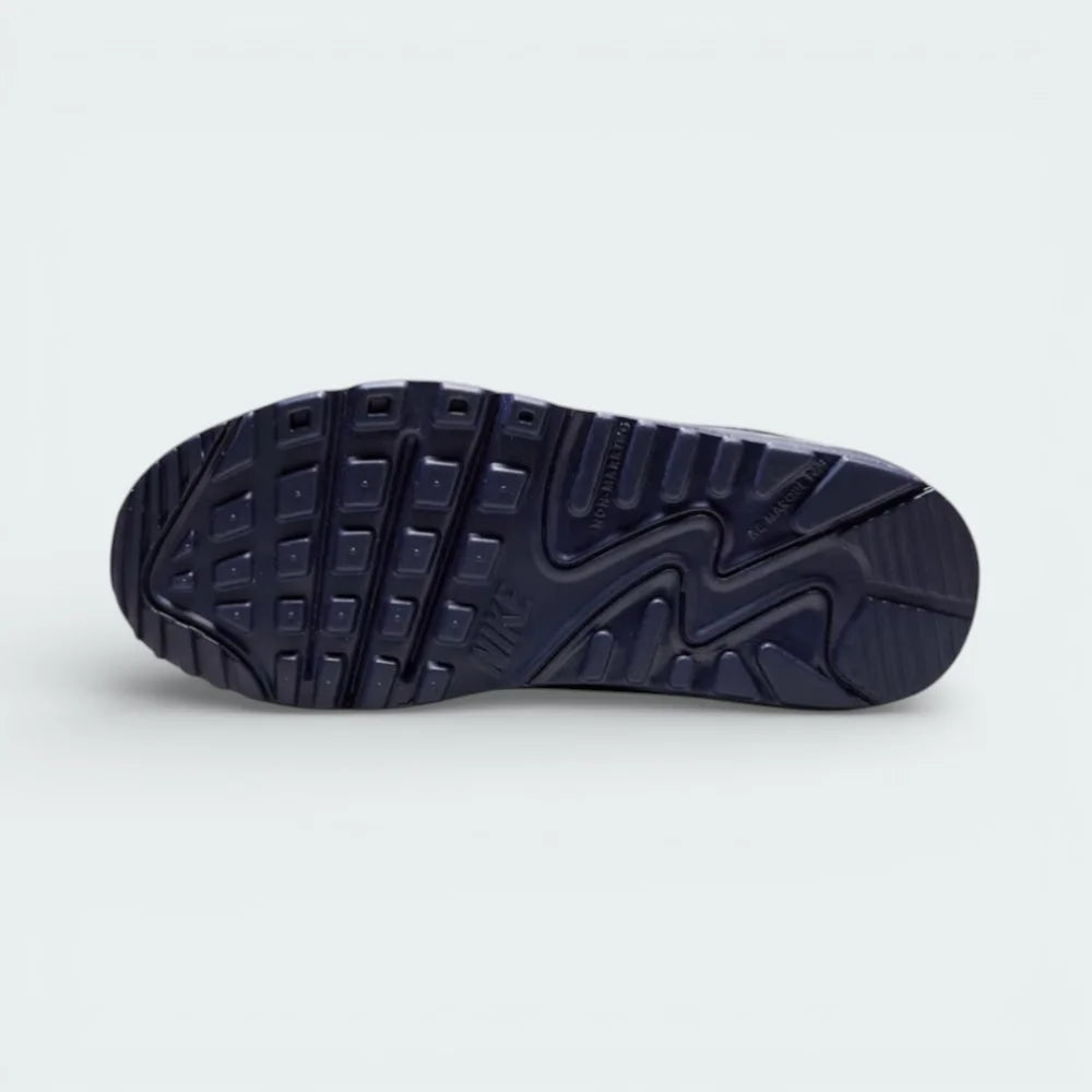 View of the rubber outsole, showcasing the legendary waffle traction pattern and the flex grooves in the forefoot.
