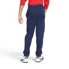 Back view of the model emphasising the clean rear drape, elastic cuffs, and overall relaxed fit.