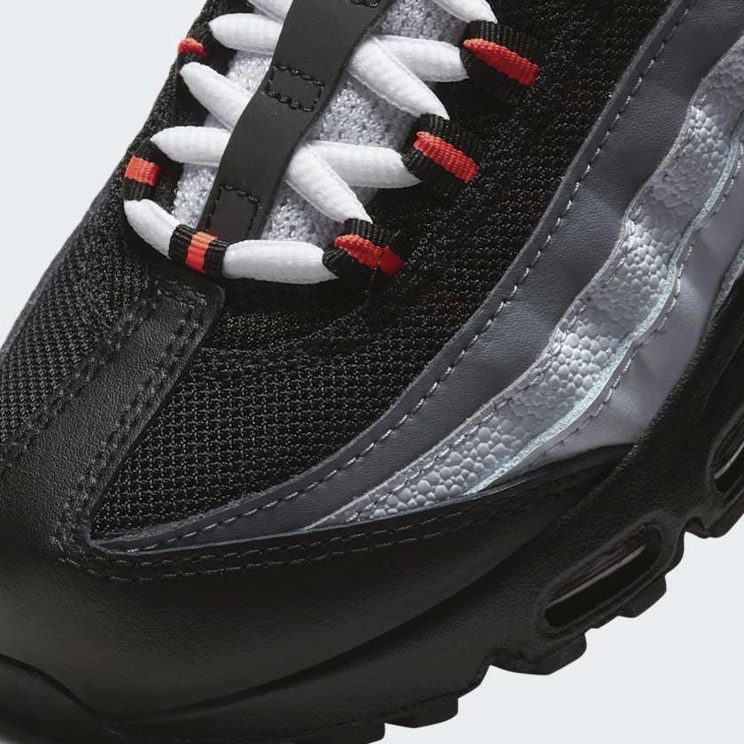 Close-up of Nike Air Max 95 Recraft Juniors White Trainers CJ3906-101 lacing system and mesh detail