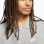 Close-up of the chest area, focusing on the precision of the white embroidered Nike Swoosh and the button detail.