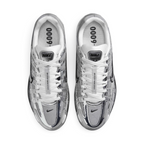 Focuses on the locked-in central lacing layout, displaying the white laces tracking through silver eyestays, central tongue ribbon printed with "BOWERMAN SERIES", metallic tongue tab badge, and insoles printed with bold "P-6000" graphics.