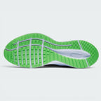 Displays the highly intricate micro-groove patterns of the black Storm-Tread rubber outsole, engineered for unreal grip and continuous water dispersion on wet pavements.