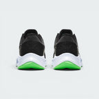 Focuses on the contoured shape of the tapered rear heel collar, showcasing the structured heel counter built to lock the ankle securely in place.